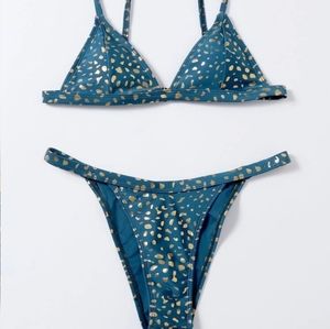 A two-piece bikini with gold foiled details